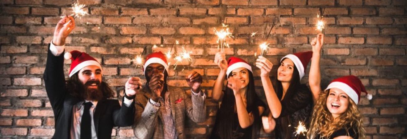 holiday gifts, people holding sparklers, sparklers,